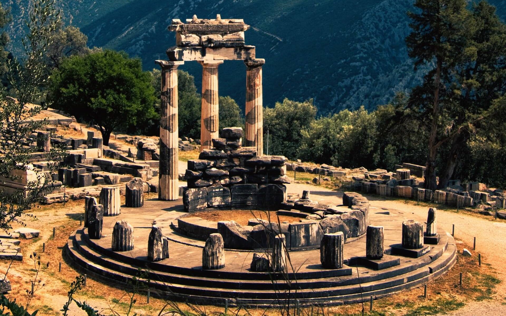 The Temple of Delphi in Greece, perched on the slopes of Mount Parnassus, a place steeped in myth and oracle.